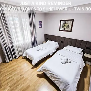 https://sunflower-rooms.hotels-in-tirana.com